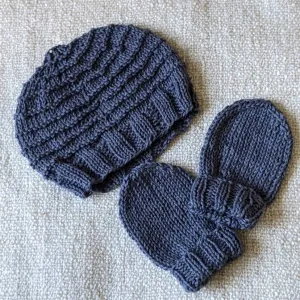 Blue hand-knitted baby gift set